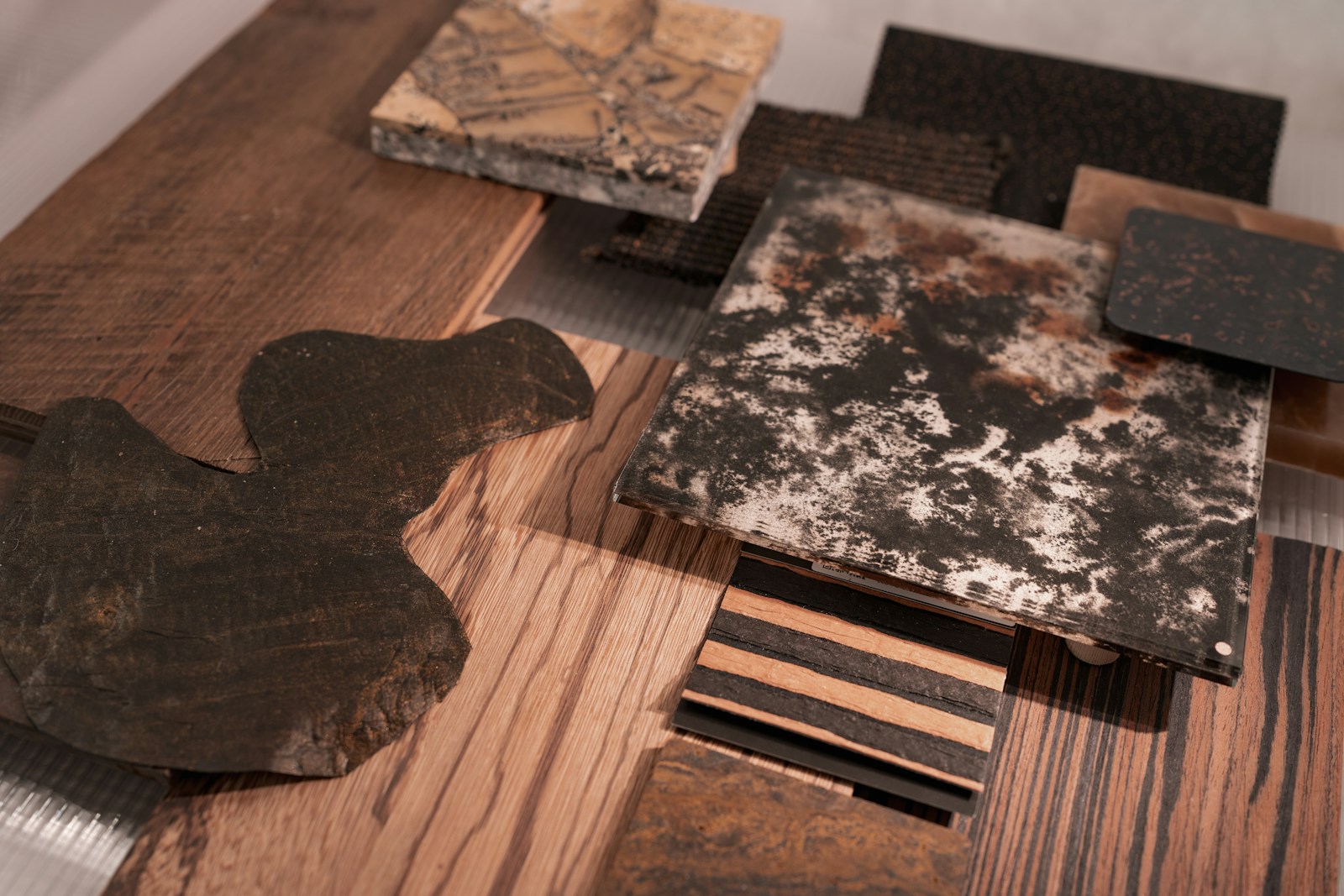 Oak, stone and metal material samples